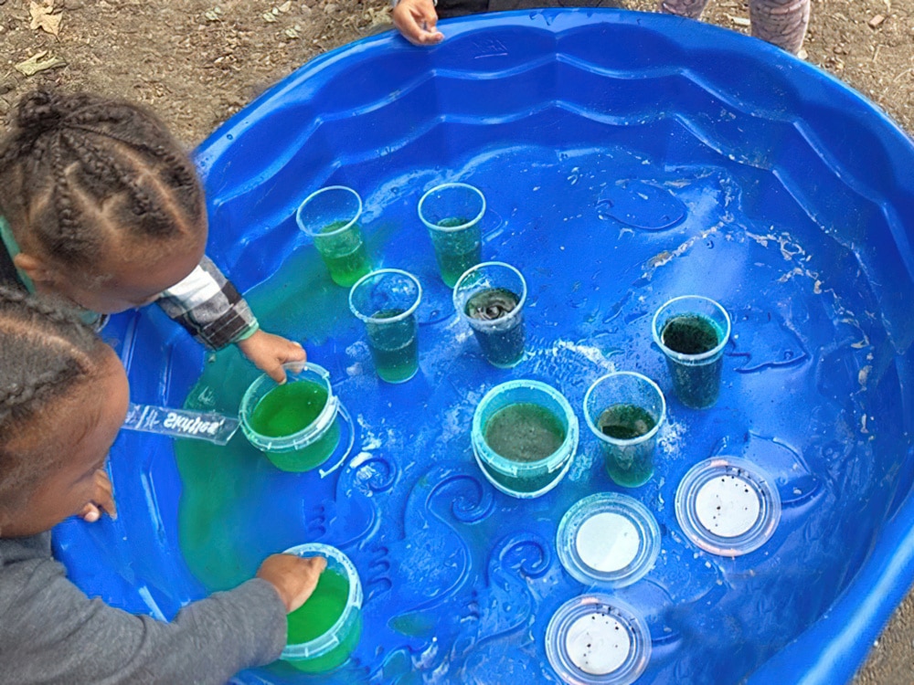 Play, Nature, & Messy Fun In An Outdoor Wonderland