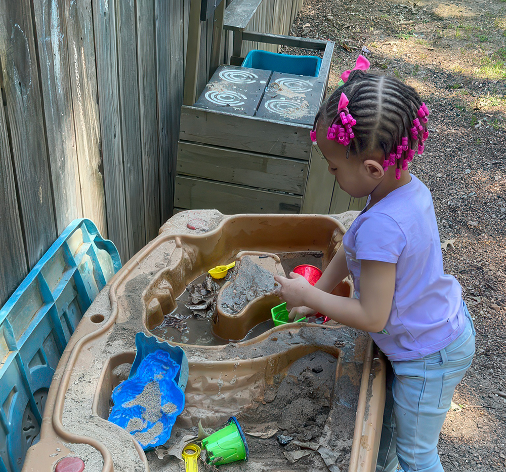 Play, Nature, & Messy Fun In An Outdoor Wonderland